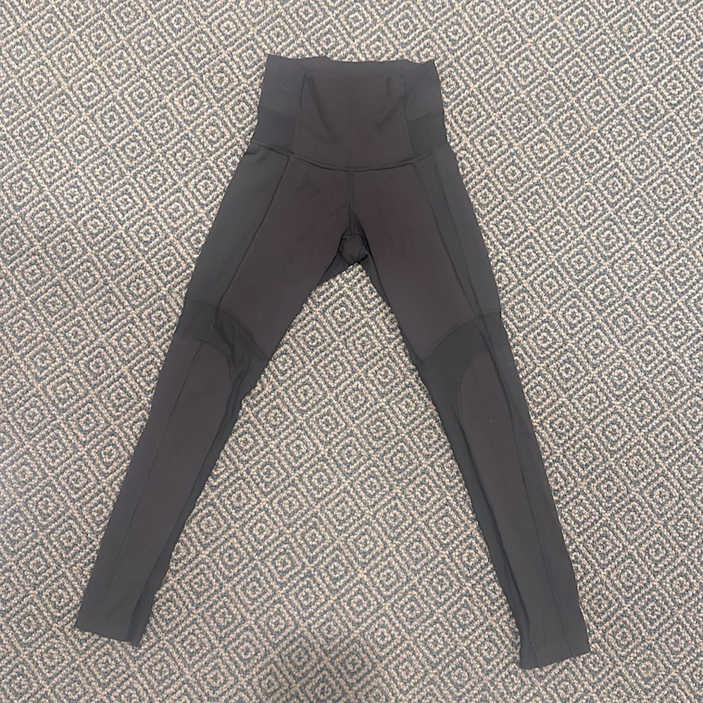 Lululemon black leggings with mesh inserts